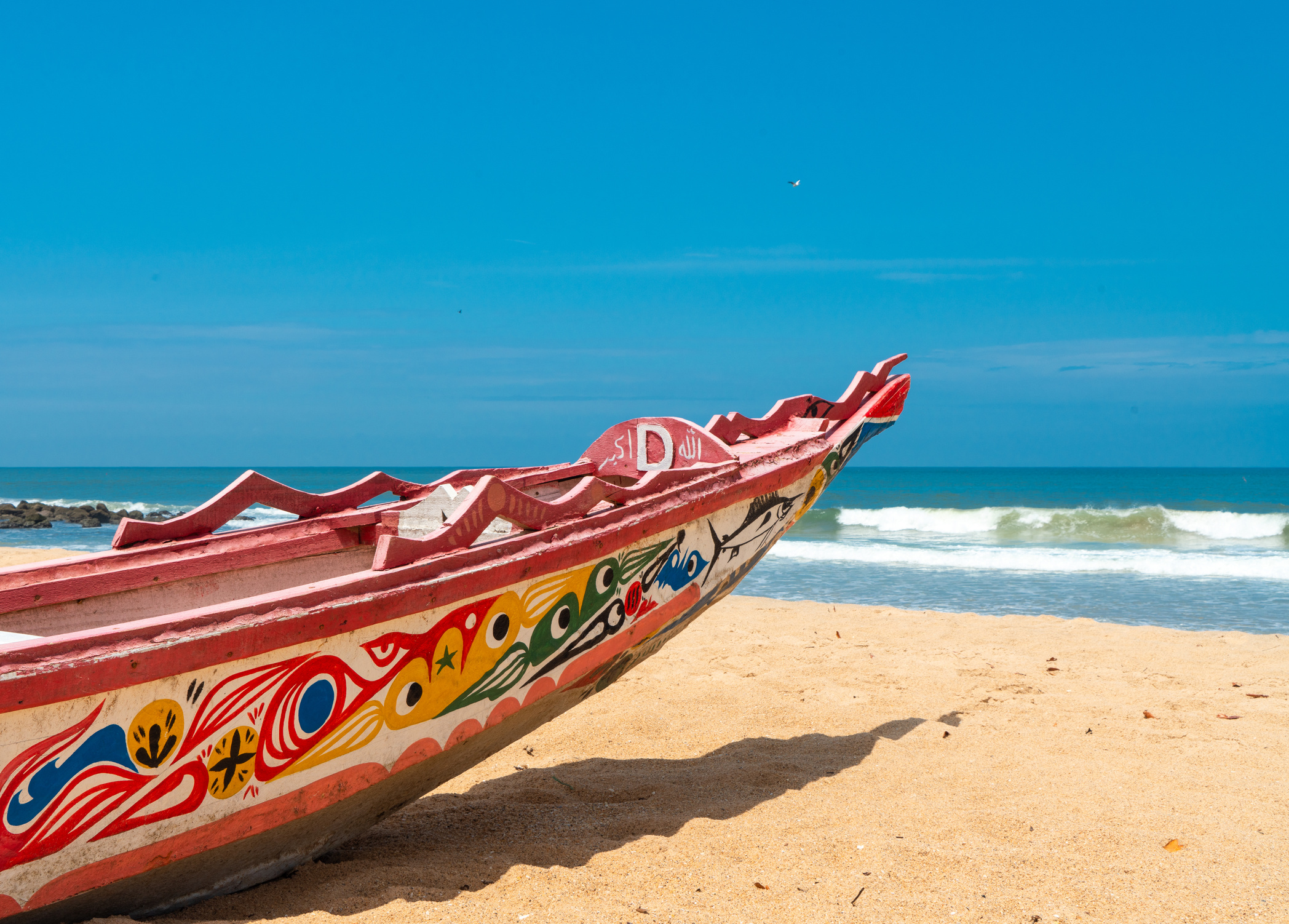 Colorful fisher boat on the beach, Somone, Senegal